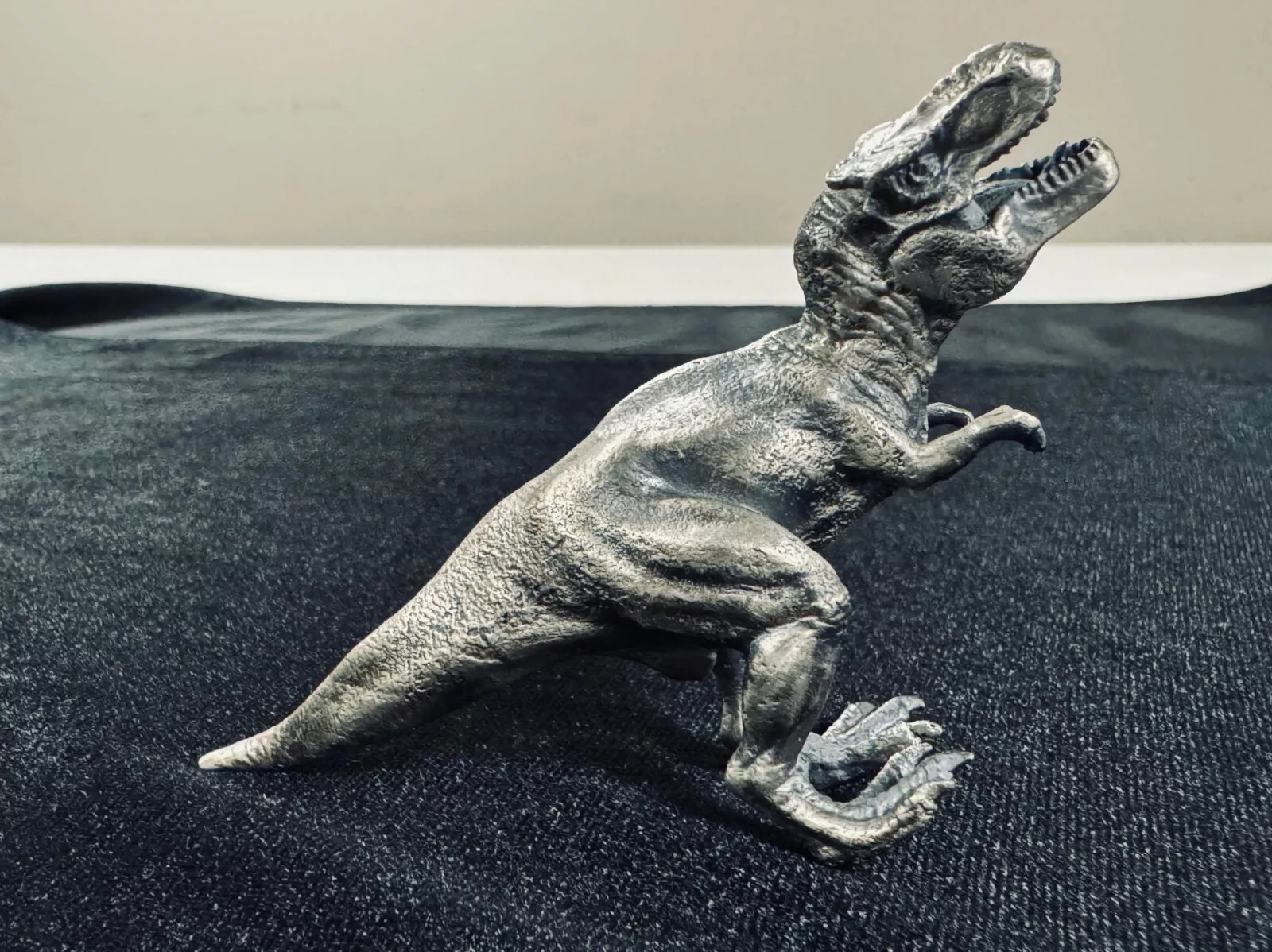 Picture of 2024 Hand Poured T-Rex Dinosaur 100 Gram Silver